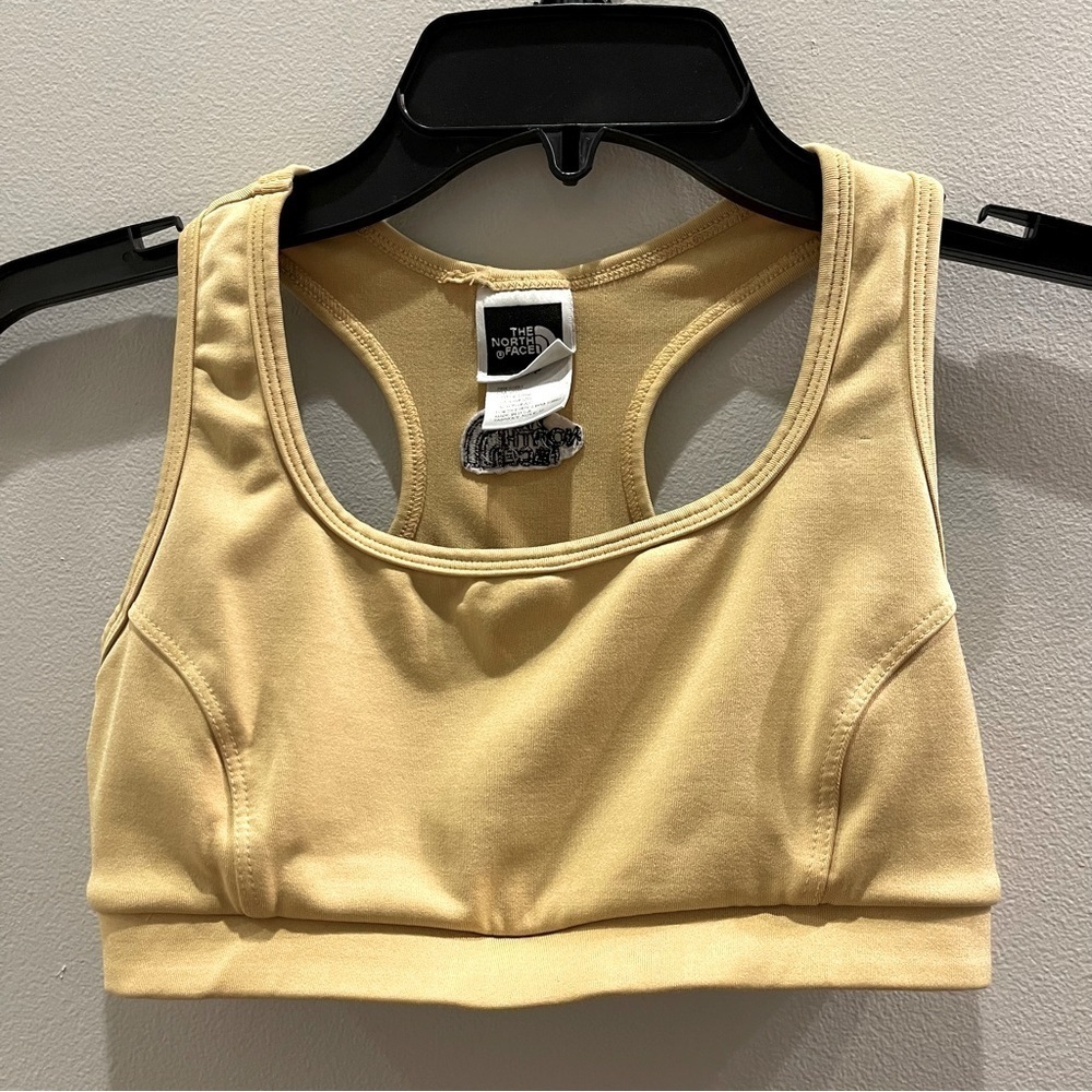 The North Face Sports bra Mustard Yellow Women’s S Lined but no padding Flawed